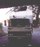 Some wanker, not a con member, destroying part of the motel with his truck